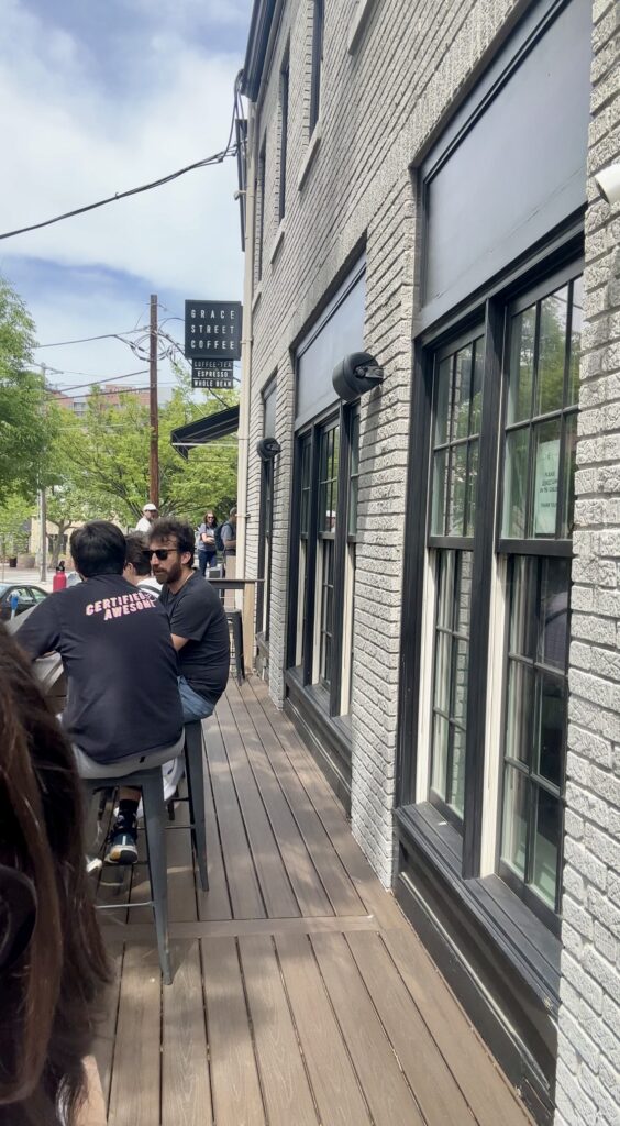 Customers enjoying coffee outdoors in Downtown Bethesda.