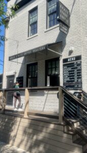 The walk-up coffee counter and small deck area at Grace Street Coffee in Bethesda, Maryland.