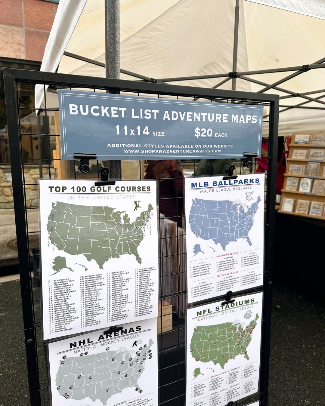 Bucket List Adventure Maps sign shows themed prints, dimensions and prices.