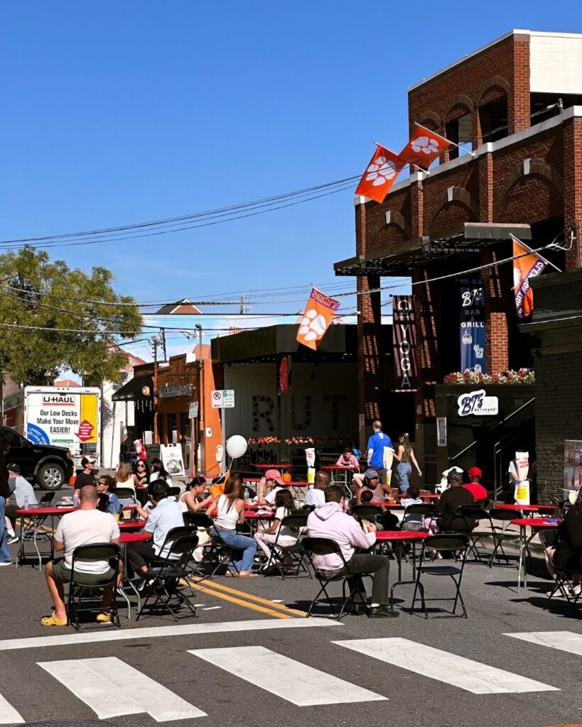 Rows of folding tables and chairs set up for outdoor festival dining in Bethesda
