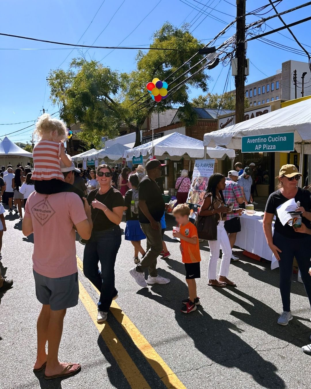 Restaurant vendor tents featuring Aventino Cucina and AP Pizza at Bethesda food festival